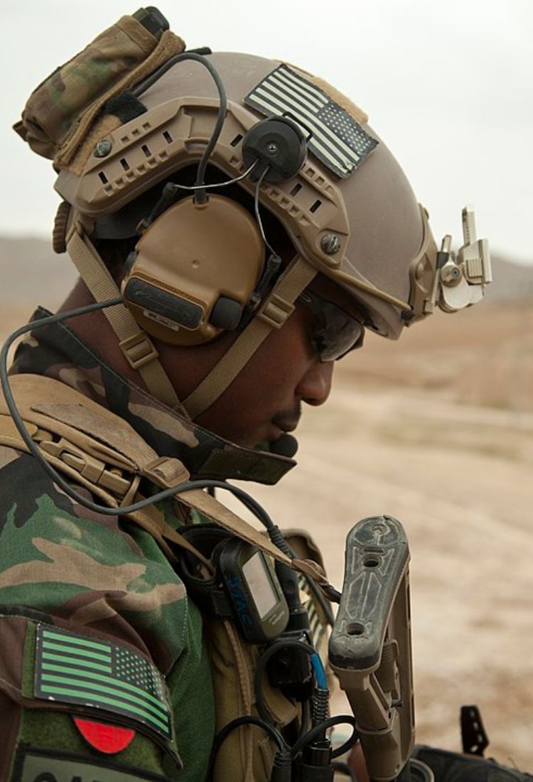 Military man wearing a ballistic helmet